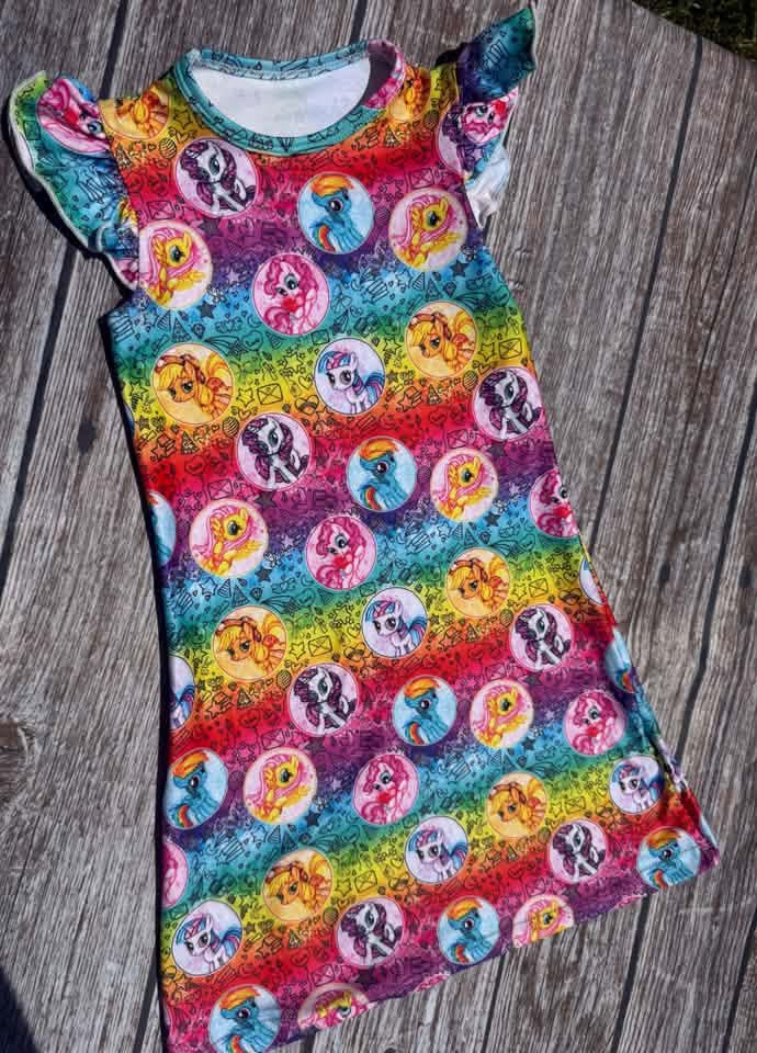 Rainbow pony pals nightgown featuring a colorful all over pony print and sweet flutter sleeves