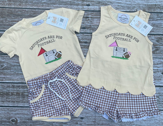 Boys and girls sibling matching football outfits with cream embroidered tops and brown gingham shorts
