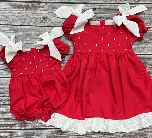 Classic Pearls red girls dress and bubble with pearl details, white shoulder bows, puff sleeves, and white eyelet lace trim.