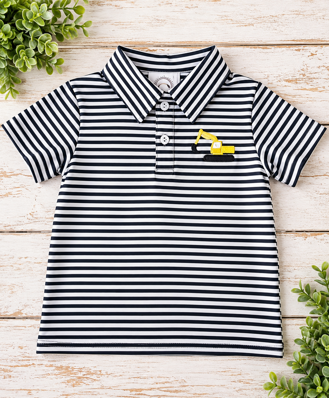 Boys black and white striped polo shirt with yellow embroidered excavator