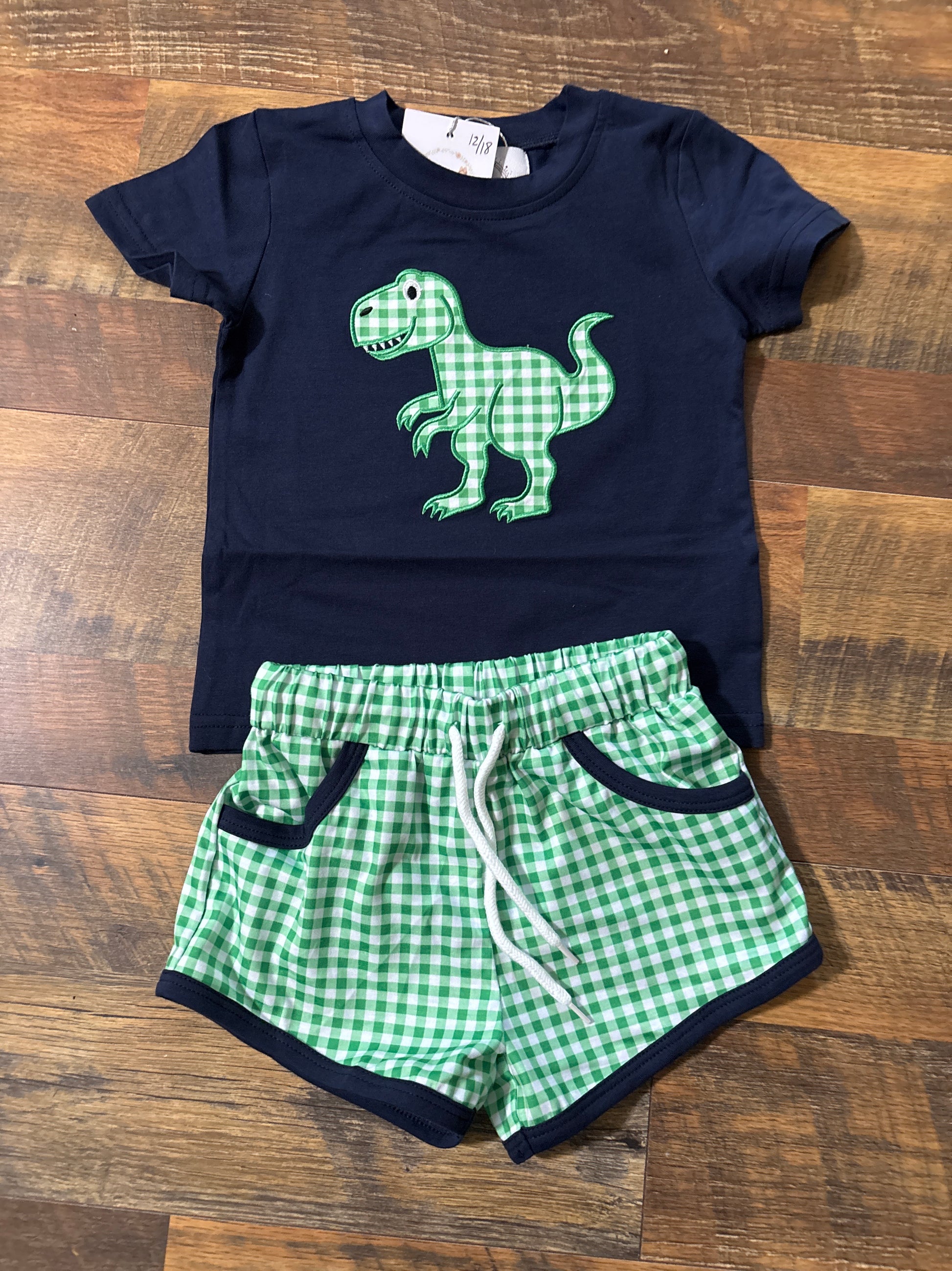 Dino Stomp boys short set with navy dinosaur applique shirt and green gingham shorts