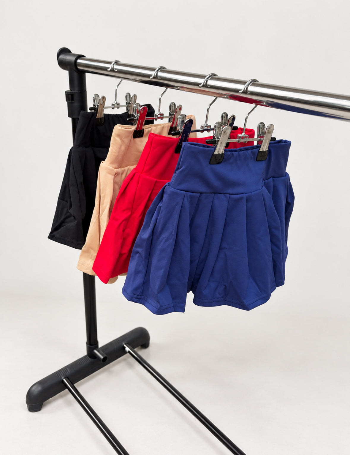 Girls pleated skorts with built-in shorts in black, khaki, red and royal blue