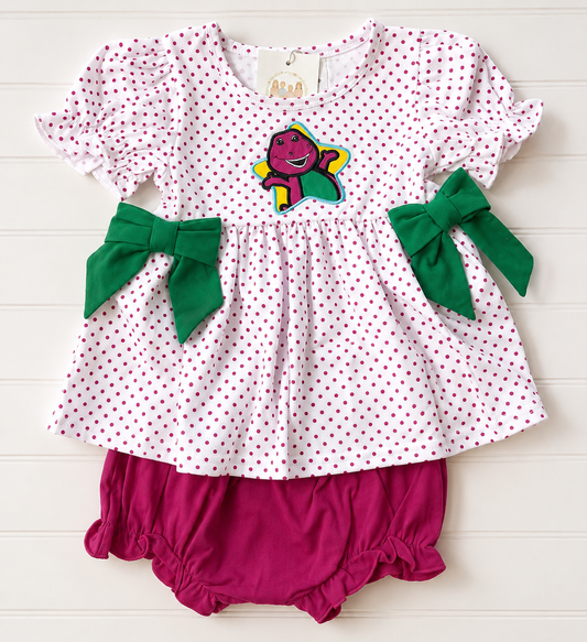 Purple Dino girls bloomer set with colorful dinosaur appliqué, pink polka dot top, green bows and berry pink ruffle bloomers
