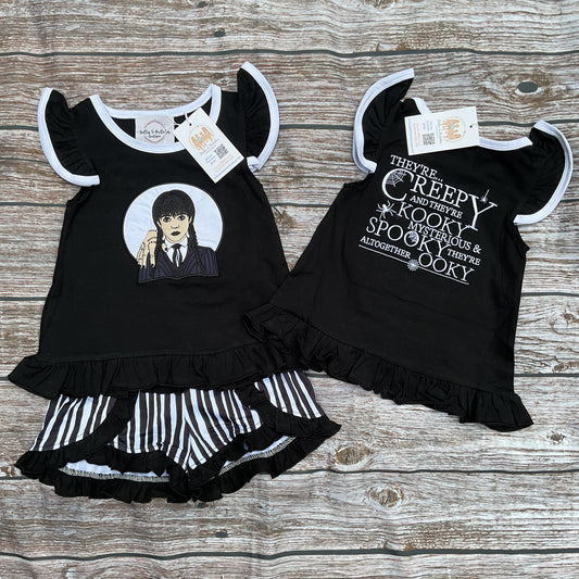 Girls black Halloween ruffle short set with spooky design and black and white striped shorts