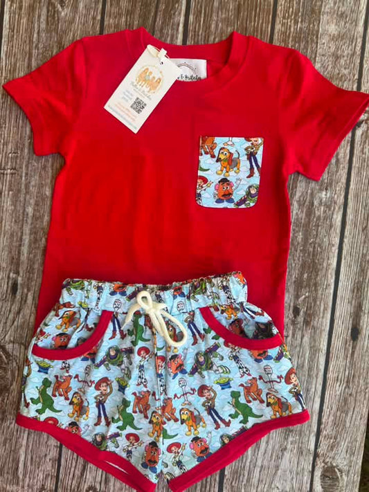 Toy Pals boys short set with red short sleeve pocket shirt and light blue toy-inspired print shorts with red trim, pockets, and drawstring.