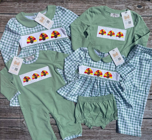 Turkey Trot Thanksgiving sibling collection with girls dress and bloomer set, boys pants set and romper featuring colorful turkey embroidery