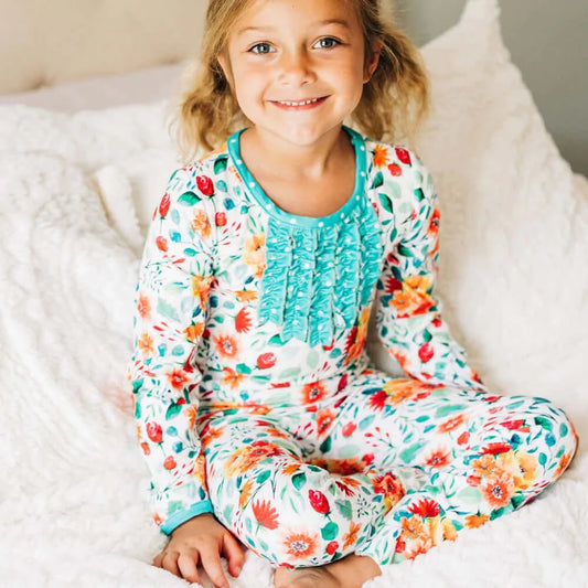image of little girl wearing ruffle pajamas with butt flap